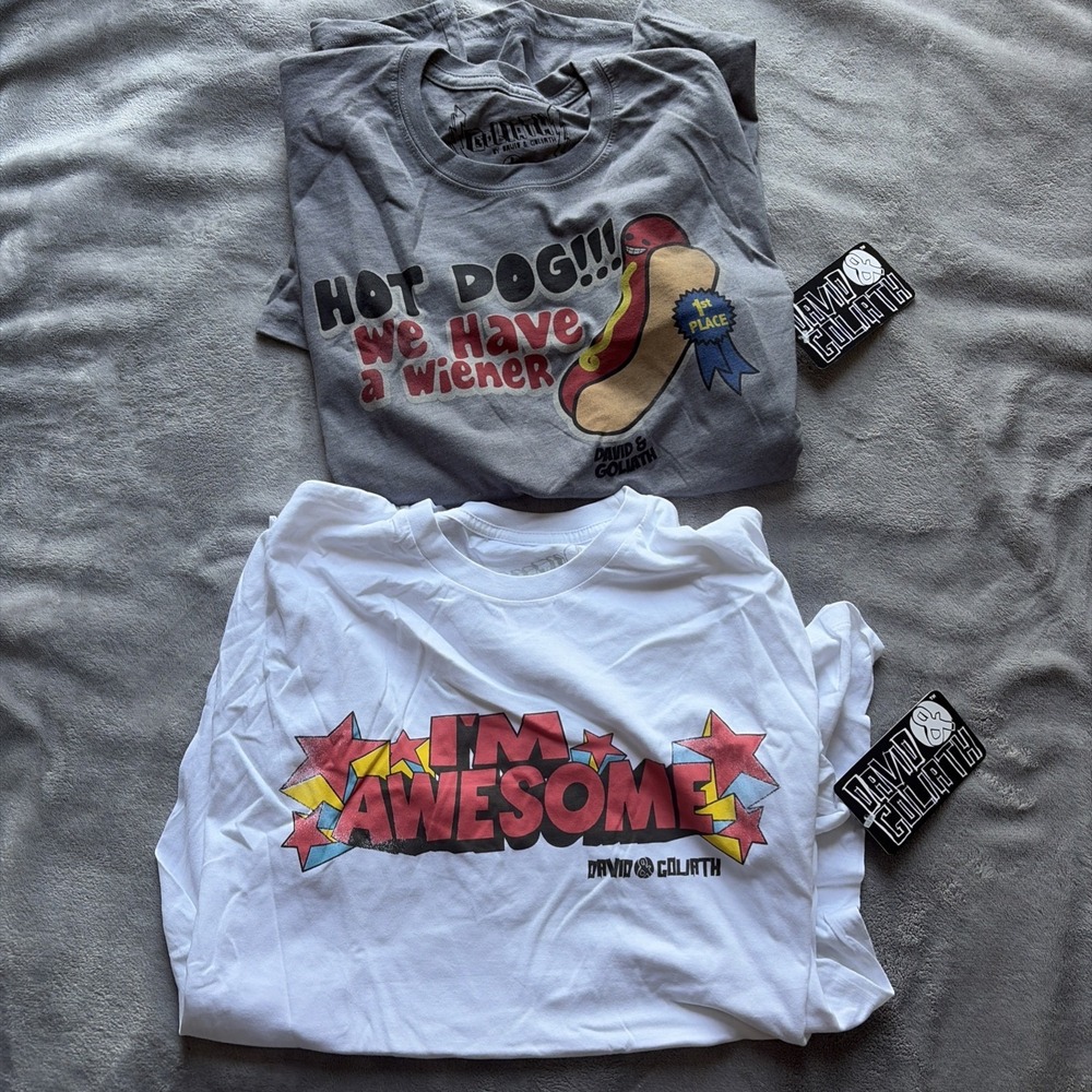 Lot Of 2 Mens Large David & Goliath Novelty Tee T-Shirts Hot Dog Awesome - NWT